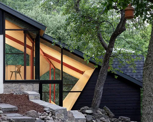 Someone turned a sad 1970s chalet into a stunning four-level forest home and yes, we're jealous