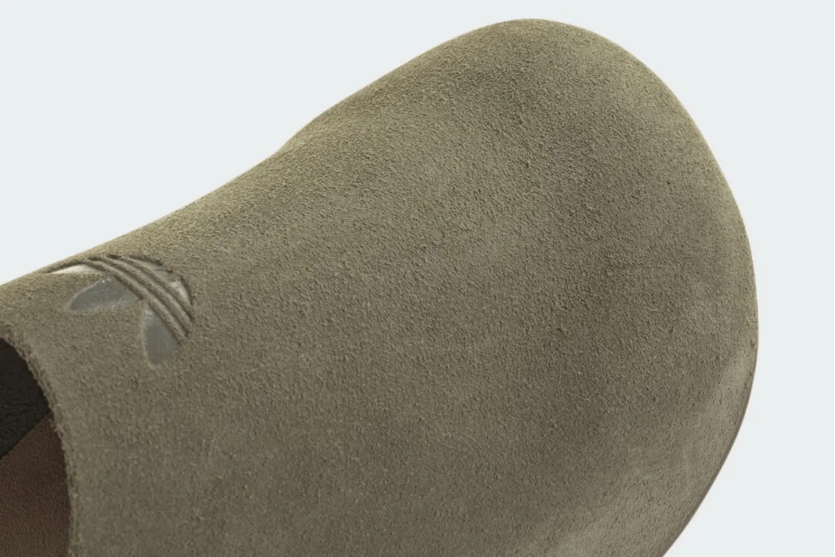 adidas just dropped an olive green shoe that looks like it gave up halfway through becoming a clog