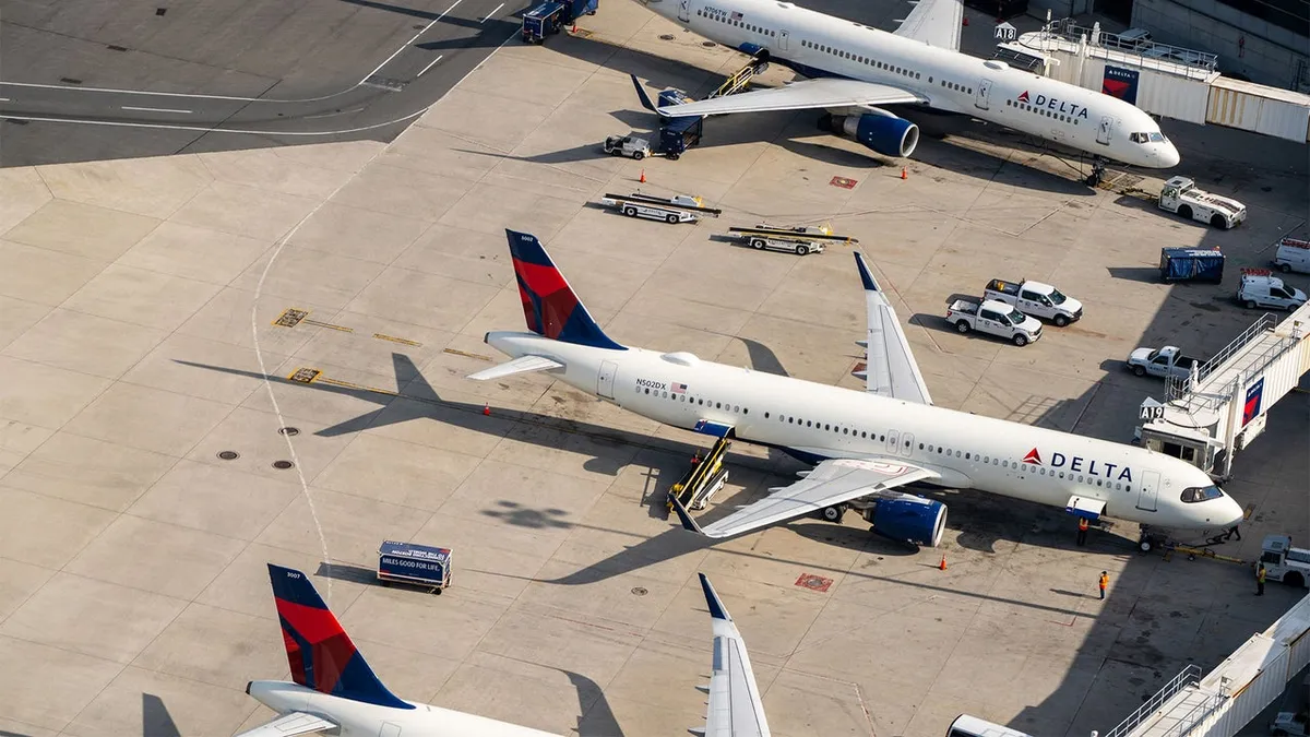Delta will let you sit in business class for less money, but they're absolutely going to make you feel it