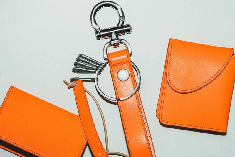 Your tote bag is embarrassing and these $400 orange leather goods are the intervention you didn't ask for