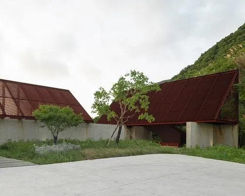 These rust-toned pavilions on the chinese coast are designed around the art of looking