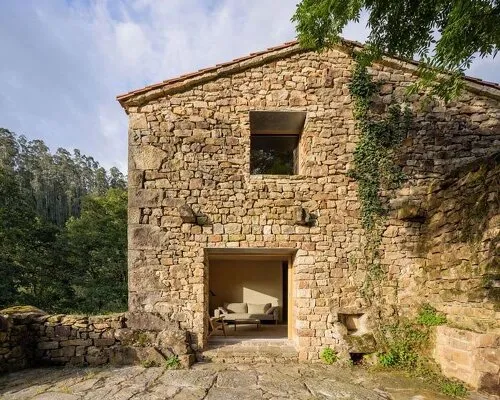 This abandoned stone cabin in northern spain is now a masterclass in cozy, conscious living
