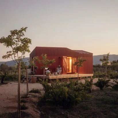 This tiny 20m² red cabin in Greece is exactly the holiday home you didn't know you needed